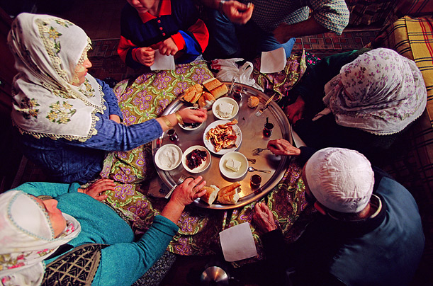 A photo by Peter Menzel from the Hungry Planet book shows a Turkish family eating breakfast