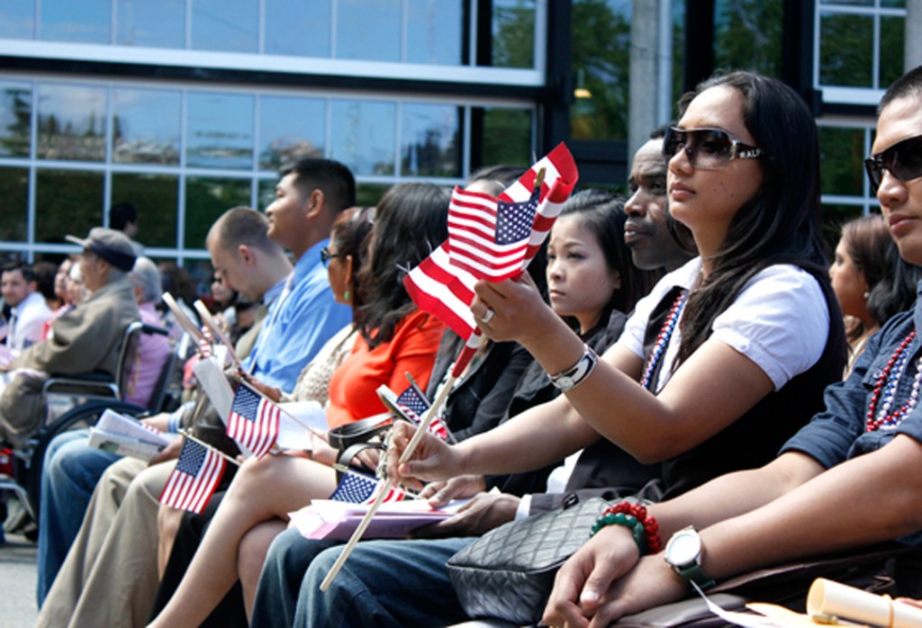 Candidates for U.S. citizenship wait to be sworn in at the 28th Annual Naturalization Ceremony on July 4th at the Seattle Center.