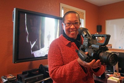 Filmmaker Eli Kimaro in her Columbia City home. Her documentary 'A Lot Like You' has won acclaim around the world and opens at the Seattle Asian American Film Festival tonight. (Photo by Greg Gilbert/Seattle Times)