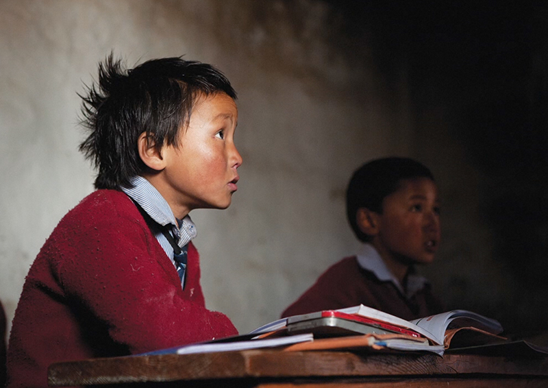 Students learn the national curriculum in the mother language at an NGO-supported private school in Lo Manthang. The community hopes to preserve their unique Tibetan dialect, Lowa, for future generations. (Photo by Taylor Weidman)