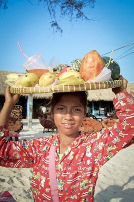 Selling fruit on the beach in Sihanoukville. (Photo by Roxana Norouzi)