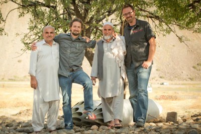 Combat Flip Flops founders Matthew 'Griff' Griffin (second from left) and Andrew Sewrey (right) pose with locals in the Panjshir Valley, Afghanistan. (Photo by Jed Conklin)