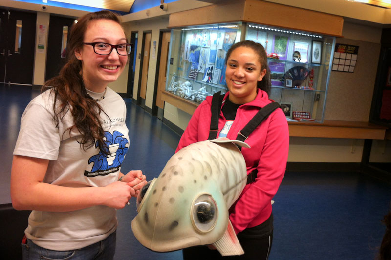 Chief Sealth students Sonora Carroll and Rachel Varney celebrate World Water Week. (Photo by Sarah Stuteville)