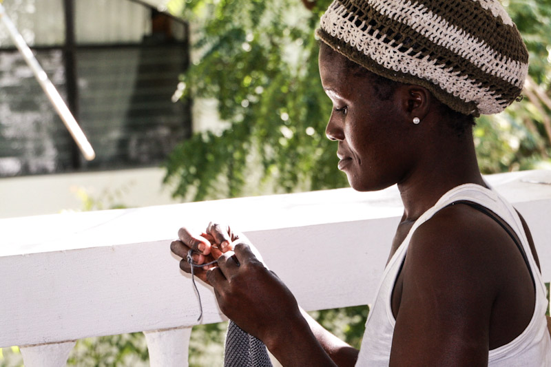 Beatrice, one of the mothers working with Haiti Babi, crochets a blanket. (Photo courtesy Katlin Jackson)