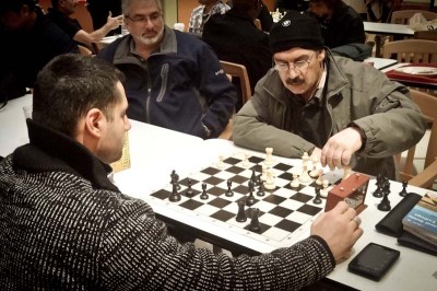 Crossroads Mall prides itself as the "living room" of the Eastside's immigrant community. Chess games are always in session. (Photo by Ilona Idlis)
