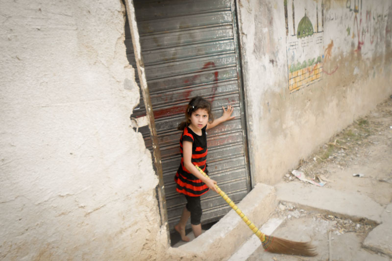 A girl in the Tripoli refugee camp that now houses thousands of Syrian refugees. (Photo by Justin Salhani)