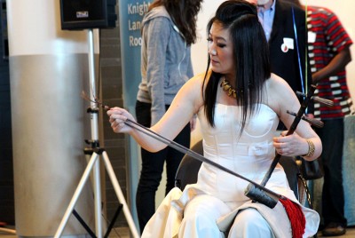 Lucy Wu of Nanjing, China, represents Seattle Sister City Chongqing, China with her musical performance by playing the jinghu, a two-stringed Chinese-style fiddle at the 17 Annual Seattle Sister Cities reception. (Photo by Christian Zerbel)