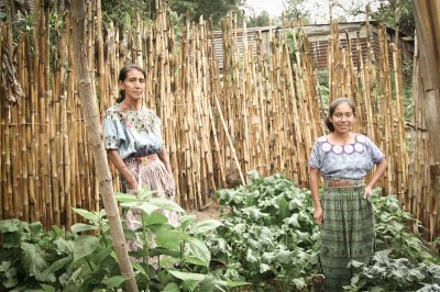 Rising Minds is working with women like Dinora (right) to increase the availability of vegetables in low-income villages. (Photo by Karen Story)