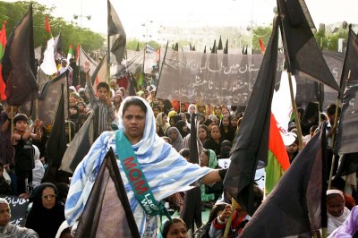 Supporters of the MQM party rally in Karachi in 2009. MQM rallies were targeted by Taliban attacks during the run-up to this year's election. (Photo by Alex Stonehill)