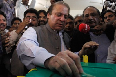 Nawaz Sharif, leader of the Pakistan Muslim League - Nawaz (PML-N) political party, casts his vote for the general election at a polling station in Lahore last week. (Photo by REUTERS/Mohsin Raza) 