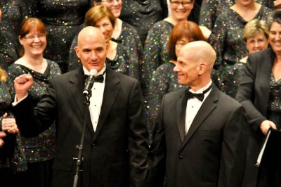 The Seattle Men’s Chorus Assistant Artistic Director Eric Lane Barnes (left).
