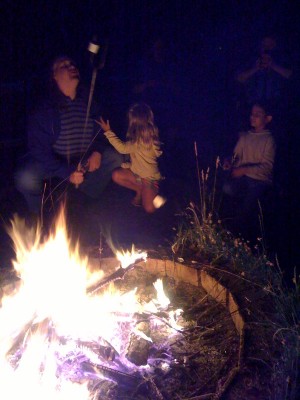 Toasting smores around a campfire July 4th. Photo by Frederica Jansz.