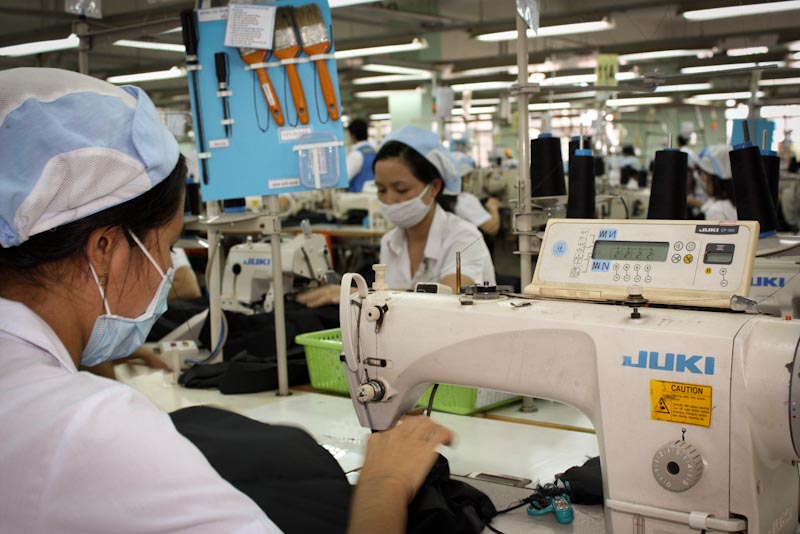 In response to raising wage demands in China and Central America, apparel manufacturing has shifted to Southeast Asian factories like this one in Vietnam. (Photo by A. Dow / ILO)