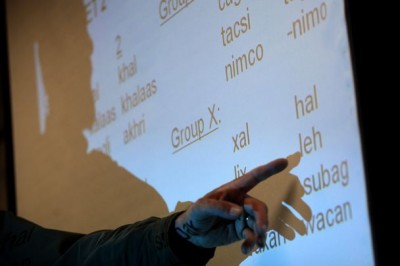 Instructor Doug Person points to the screen during the Somali class held in Tukwila. Registration is still open for fall classes. (Photo by Bettina Hansen / The Seattle Times)