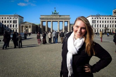 A study abroad student at Berlin's Brandenburg Gate. (Photo by KatieJean97 via Flickr)