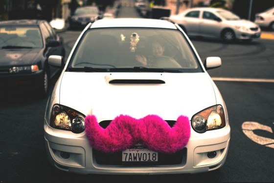 A Lyft driver in San Francisco, where many of the ride-share services originated. (Photo by <a href="http://www.flickr.com/photos/bootleggersson/">Alfredo Mendez </a>via Flickr)