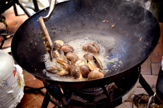 Manila clams prepare to become curry. (Photo courtesy Kedai Makan)