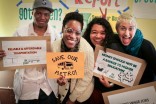 Youth including Nan Mukungu (second from left) posed for photos displaying priorities of the Young Workers in the Green Economy Project. (Photo by Shann Thomas)