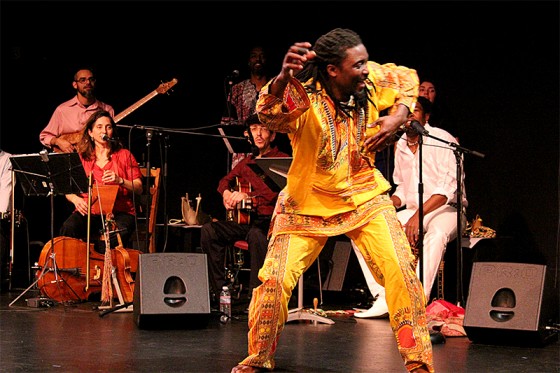 Karim Koumbassa, a Guinean performer, dances in De Cajón Project. (Photo by Aida Solomon)