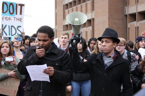 Obadiah Terry (right) leads a student walkout in Seattle. (Photo by Hali Anne)