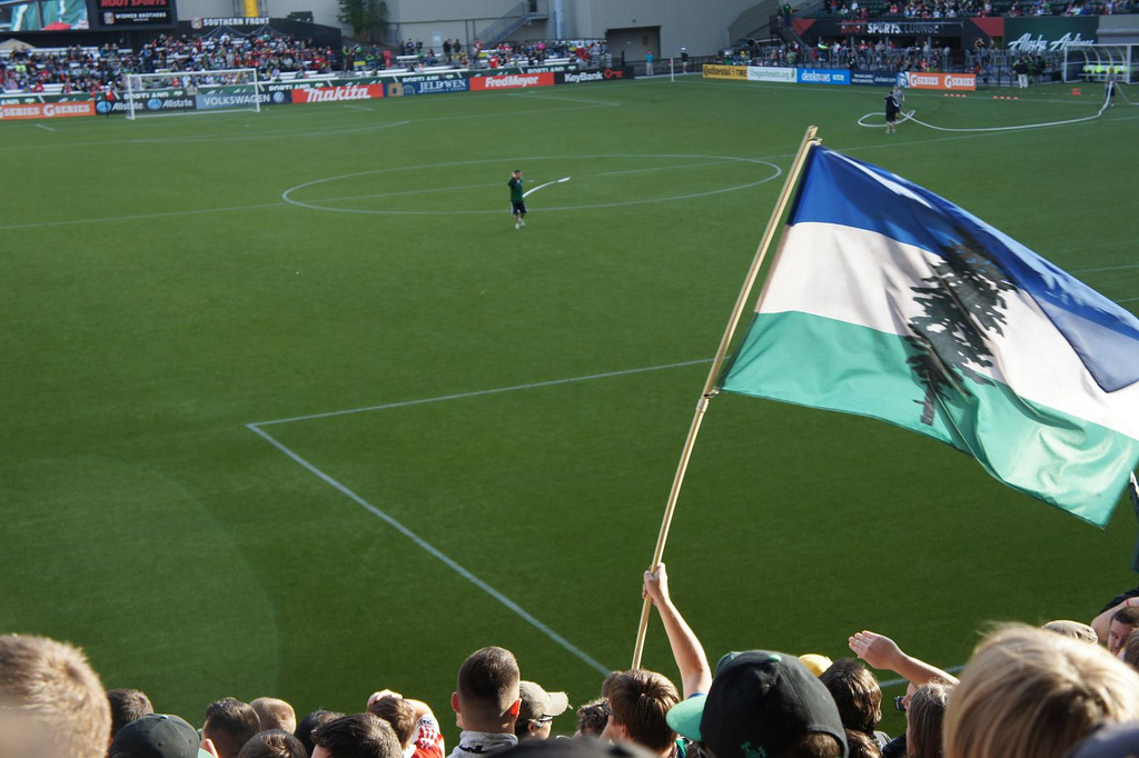 The Cascadian flag flies at a Cascadia Cup soccer game. (Photo by 104Muttons via Flickr)