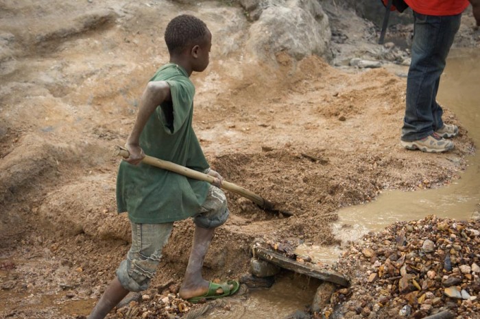 Mining operations in the Congo are often worked by children. Patrice, 15, has worked the Kaniola gold mine in South Kivu since he was eight years old. (Photo by Image Journeys Sasha Lezhnev via Flickr)