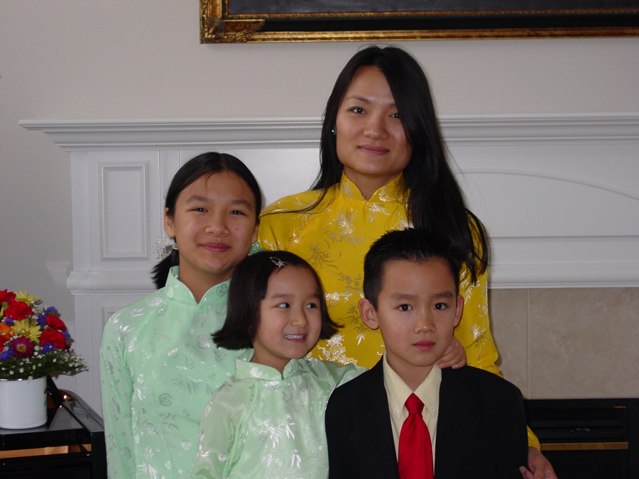 The author with his mother and two sisters in 2003. (Photo courtesy of Amanda Tran)