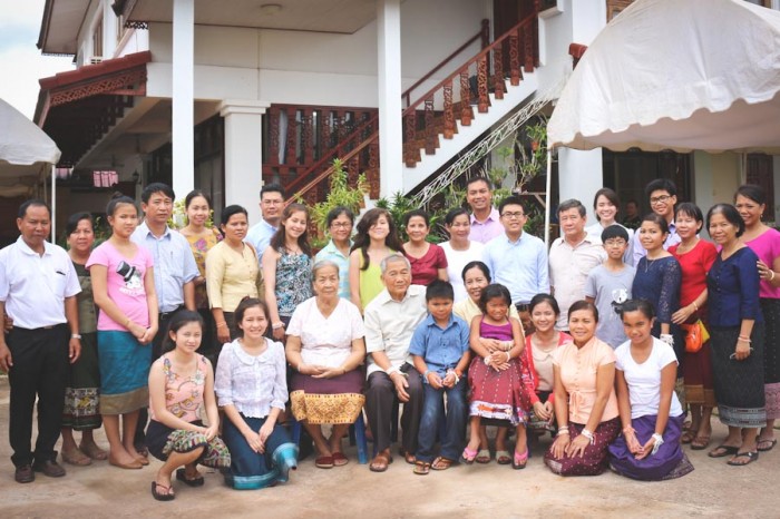 Pom Khampradith (second row, third from right) at a family reunion in Laos in summer 2013 with her siblings and extended family. (Photo courtesy Pom  Khampradith)