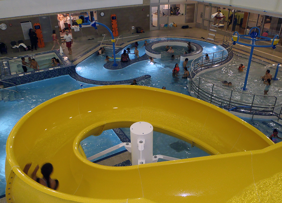 The new pool at the Rainier Beach Community Center features indoor water slides. (Photo thanks to the City of Seattle)