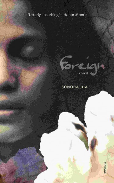Katya’s face and a cotton flower on the cover of Jha’s book Foreign. (Photo Courtesy Sonora Jha)