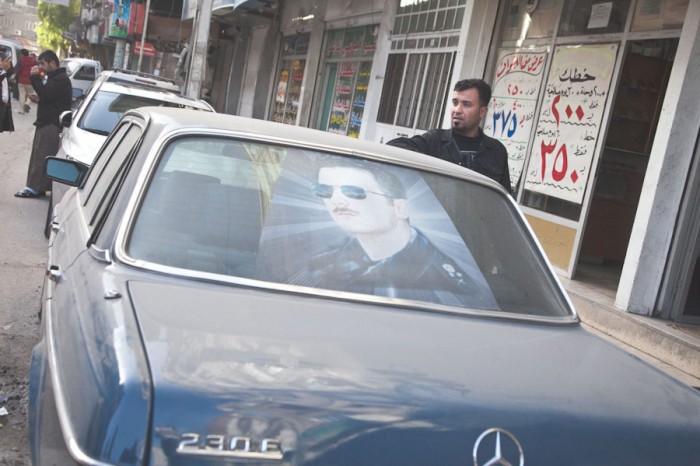 Prior to the outbreak of civil war in 2011, cars in Syria were often decorated with portraits of President Bashar al-Assad and other members of the Assad family. (Photo by Alex Stonehill)