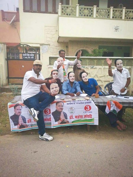 Supporters of the BJP campaign wearing masks of Narendra Modi, who is projected to be India's next Prime Minister. (Photo by Avinash Lodha)