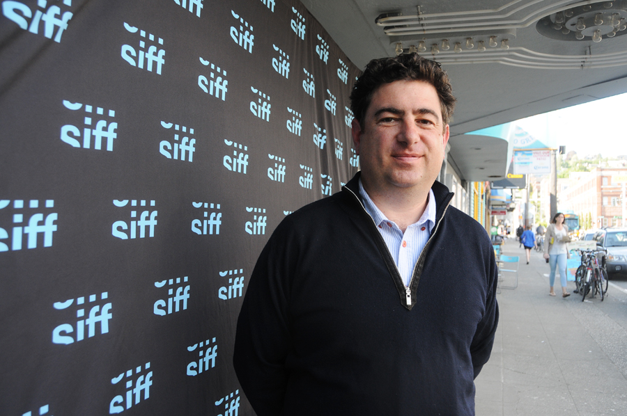 Joe Piscatella outside the Uptown SIFF Theatre, where #ChicagoGirl had its U.S. premier on Sunday. Piscatella grew up in Tacoma and says the choice to debut #ChicagoGirl at SIFF was no accident. (Photo by Alisa Reznick)