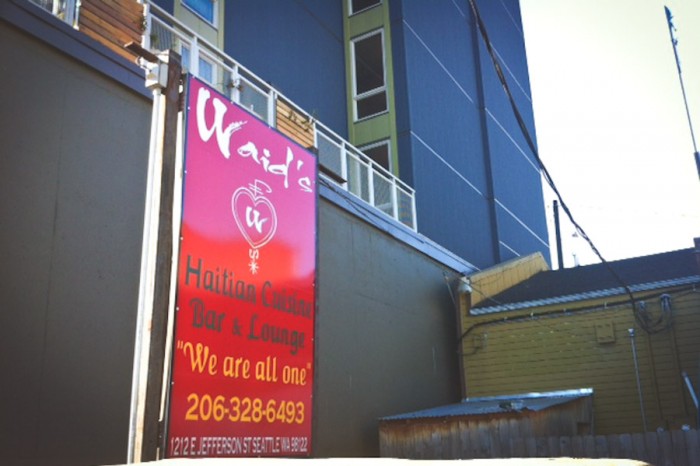 Waid's Restaurant and Lounge, in the shadow of the new Jefferson Apartment building next door. (Photo by Alex Stonehill)