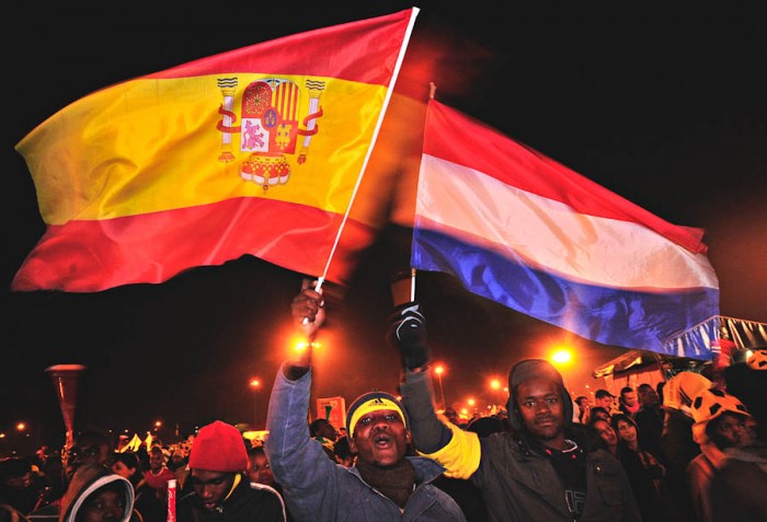 South African fans fly the flags of Spain and The Netherlands before the 2010 World Cup final. (Photo by Marcello Casal Jr / ABr)