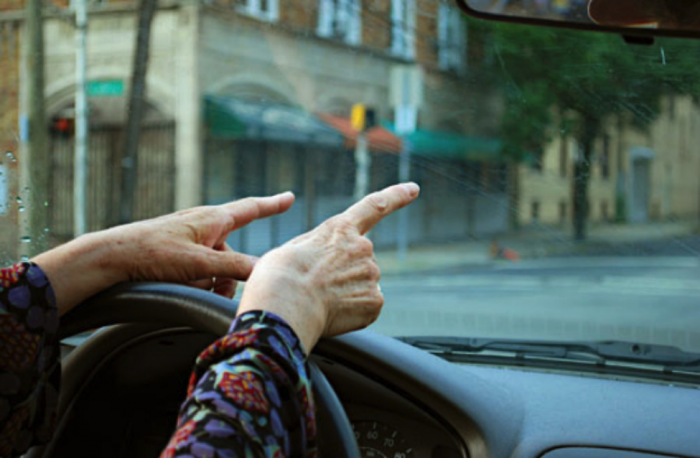 Driver focusing on directions and attentiveness. (Photo from Flickr by Leslie Feinberg)