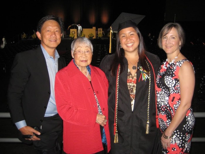 Catherine with her family on her graduation.