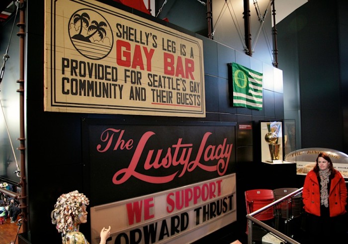The iconic sign from 'Shelly's Leg', Seattle's first disco and openly gay bar, hangs at the Museum of History and Industry. (Photo courtesy Howard Giske, MOHAI Seattle).