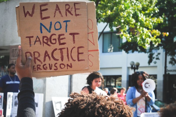 Demonstrators at Westlake Park last weekend protest a  rash of police killing civilians. (Photo by Sara McCaslin)