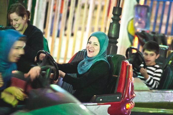 A ride on bumper cars at a late night amusement park in Sulaimaniyah, the second largest city in the Kurdish region of Iraq. Since 2003 the area enjoyed relative stability and economic success as compared to the rest of Iraq, but is now threatened by the expansion of the Islamic State. (Photo by Alex Stonehill)