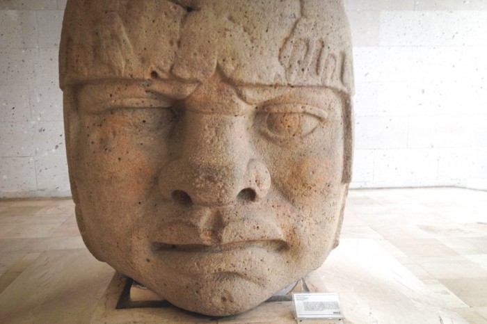 Olmec heads, on display at the Anthropology Museum in Veracruz, are often referenced as evidence of a pre-Columbian connection between Africa and Mexico because of their African features, but most anthropologists dismiss the connection. (Photo by Reagan Jackson)