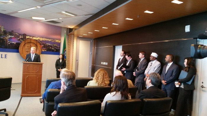 Mayor Murray announced OIRA initiatives yesterday morning at City Hall, with new OIRA director Cuc Vu, Deputy Mayor Hyeok Kim (far right) and members of the Seattle Immigrant and Refugee Commission looking on. 