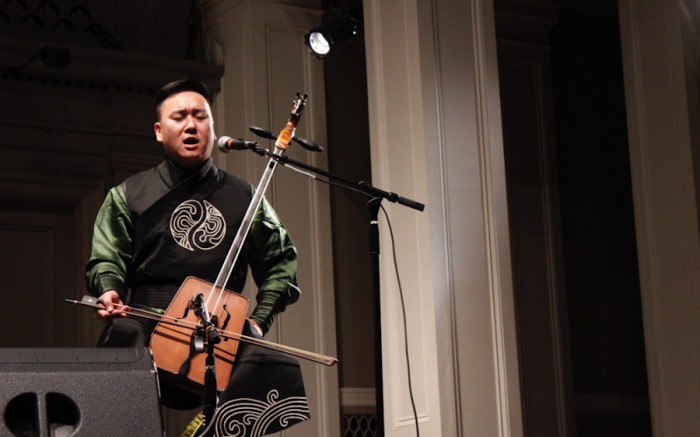 Horse head fiddle player and throat singer Davaazorig Altangerel performs as part of Mongolian orchestra Agra Bileg at Town Hall last Friday. (Photo by Aida Solomon)