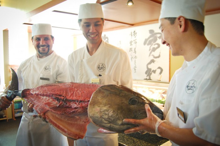 Shiro's sushi chefs Aaron Pate, Jun Takai, Tsuyoshi Kobayashi (left to right) pose with a 75 pound egg-raised bluefin tuna after Takai butchered it. (Photo by Ana Sofia Knauf)