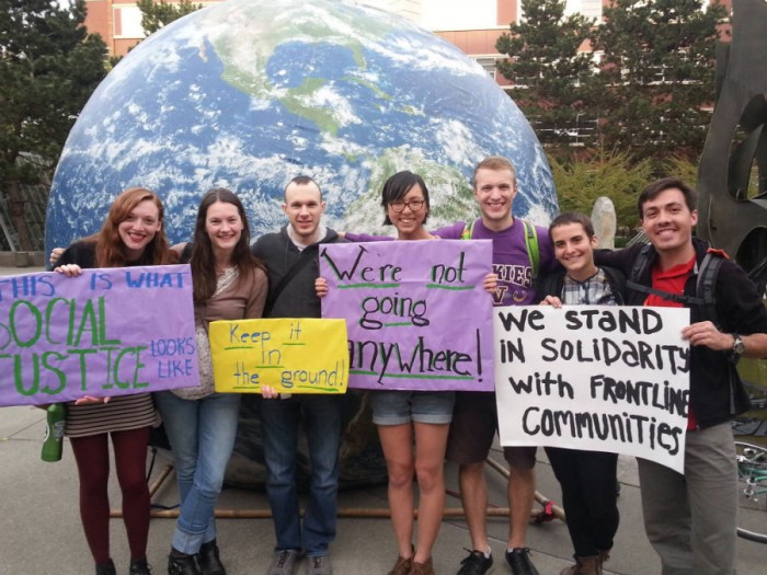 Divest UW students, including Alex Lenferna (rightmost), accompany divestment activists from Seattle University in a rally to support University divestment. (Photograph courtesy of Divest UW) 
