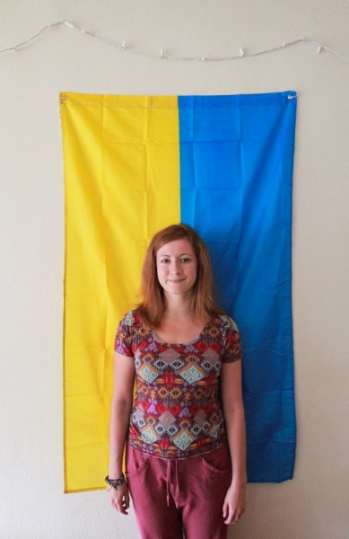 Rublinetska proudly stands in front of her flag. (Photo by Kseniya Sovenko)