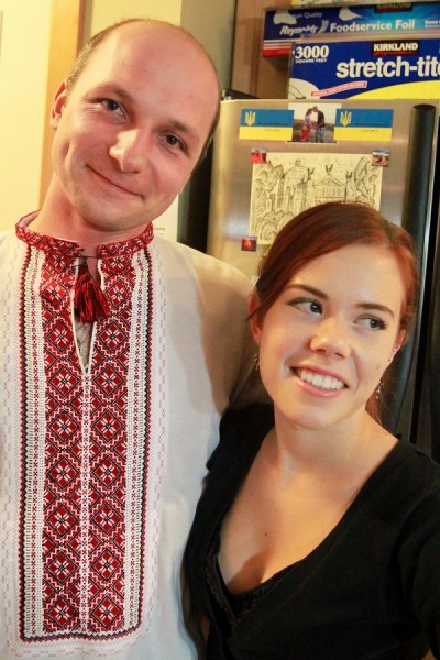 Mariya laughs about her husband’s enthusiasm to wear his favorite traditional Ukrainian shirt. (Photo by Kseniya Sovenko)