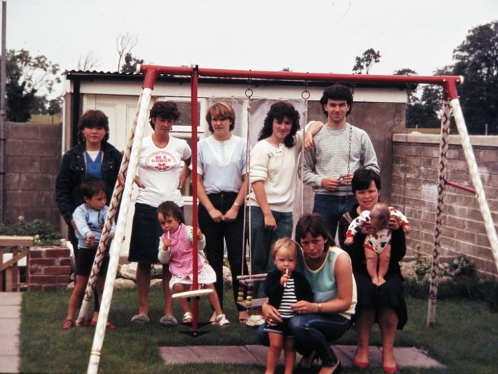 Jane McGrane (middle, back row) and Sean McGrane (right, back row) with Sean's extended family. (Photograph courtesy of Ben Hatton)