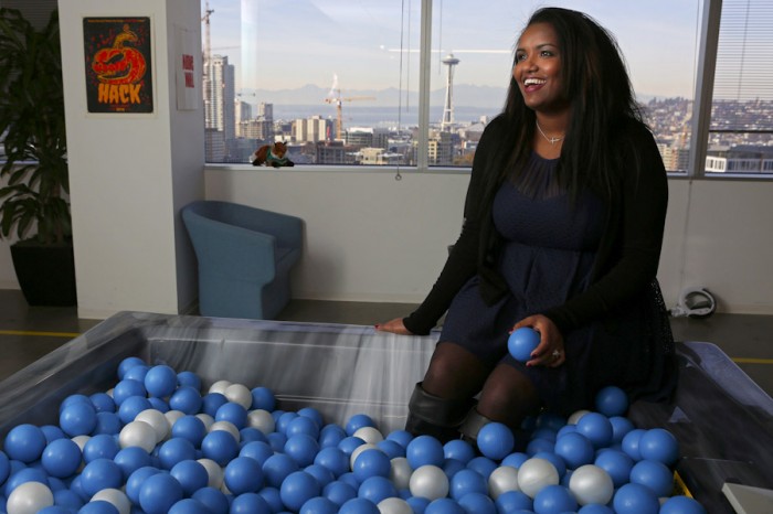 Selam Zecharias, an intern at Facebook's Seattle office, is interviewed in the office "hot tub," About one percent of Facebook employees are African-American. (Photo by Ken Lamber / The Seattle Times)