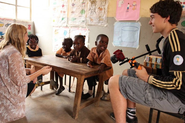 Alder Sherwood and son Josiah Sherwood work with children at the Young Generation Centre in Kisumu, Kenya for the project Africa from the Skies. (Photo courtesy of One Vibe Africa)